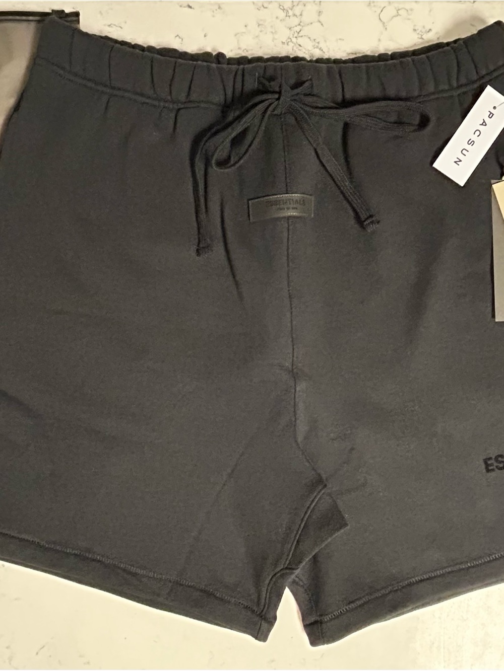 Fear of God Essentials shorts
Size L "Stretch Limo"